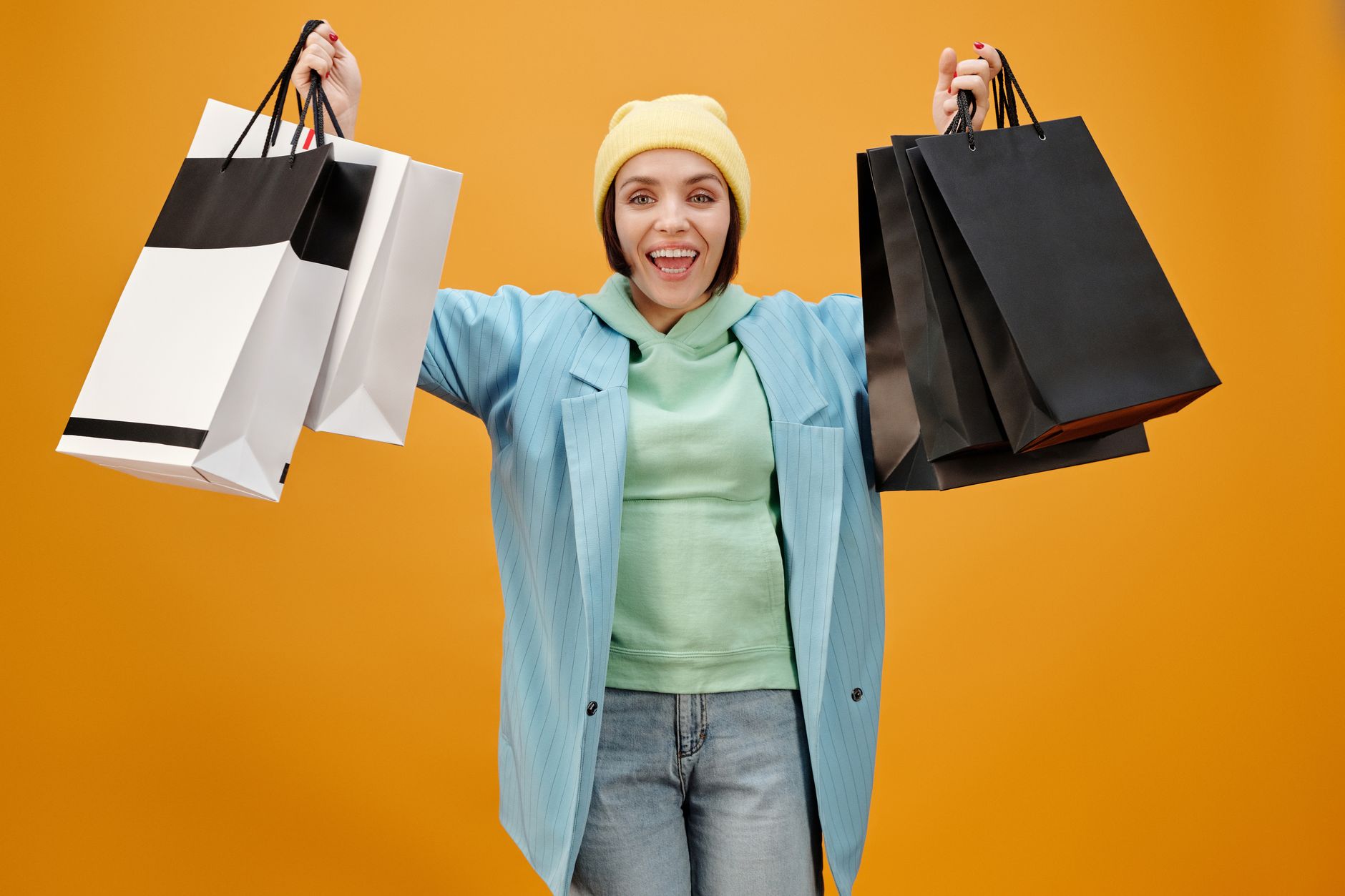 Happy customer with shopping bags — building D2C customer loyalty and retention